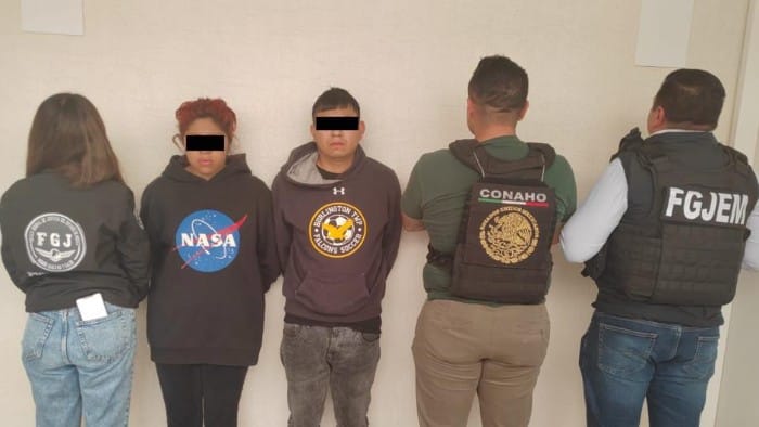 pareja detenidos