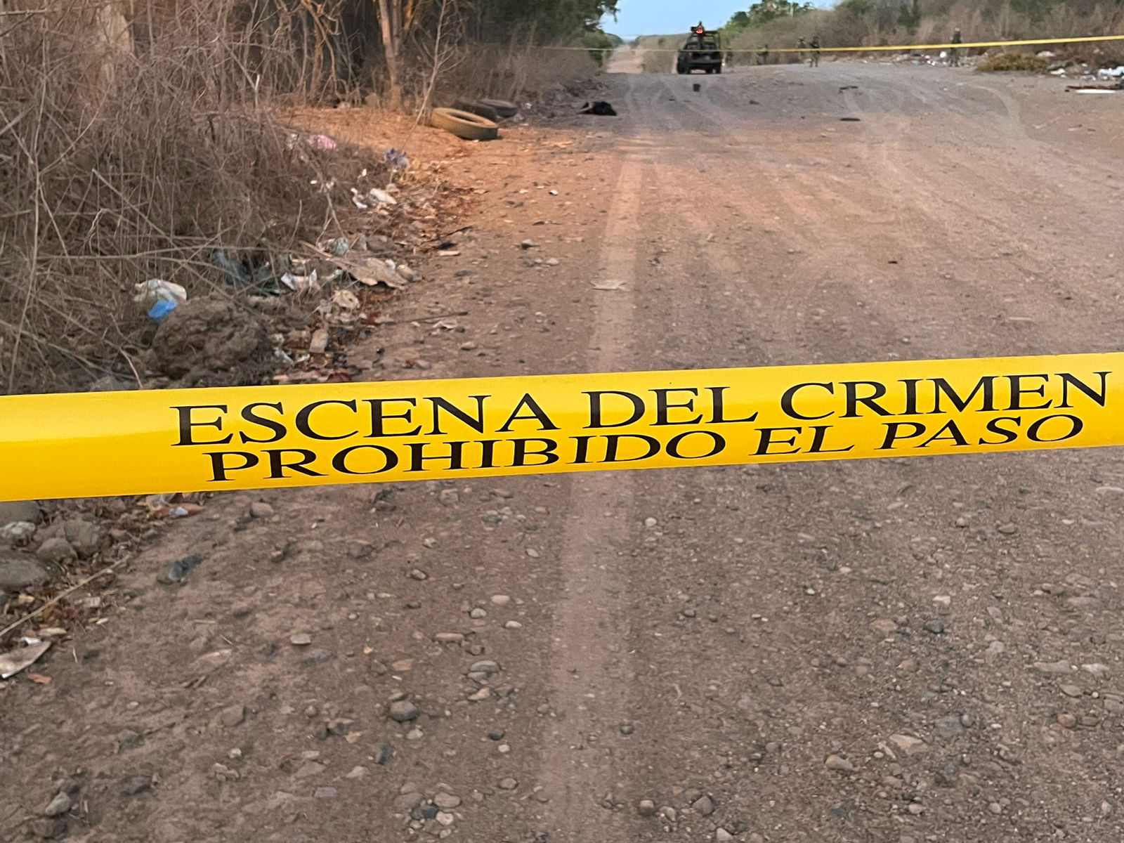 Escena del crimen delimitada con cinta amarilla