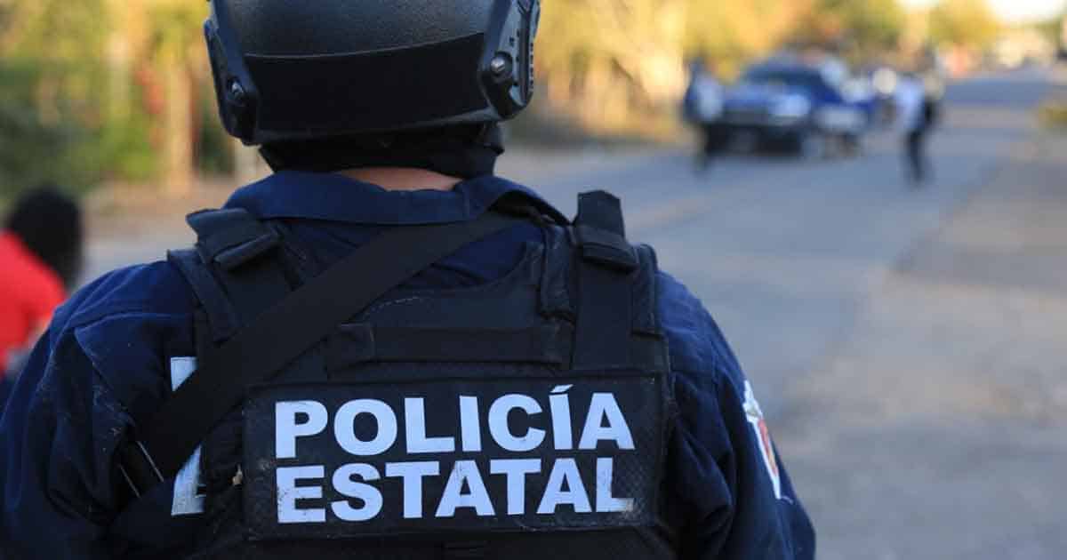 Elemento de la Policía Estatal de espaldas