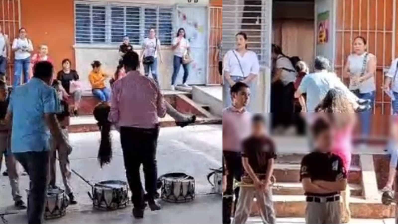 Hombre cargando a niña desmayada