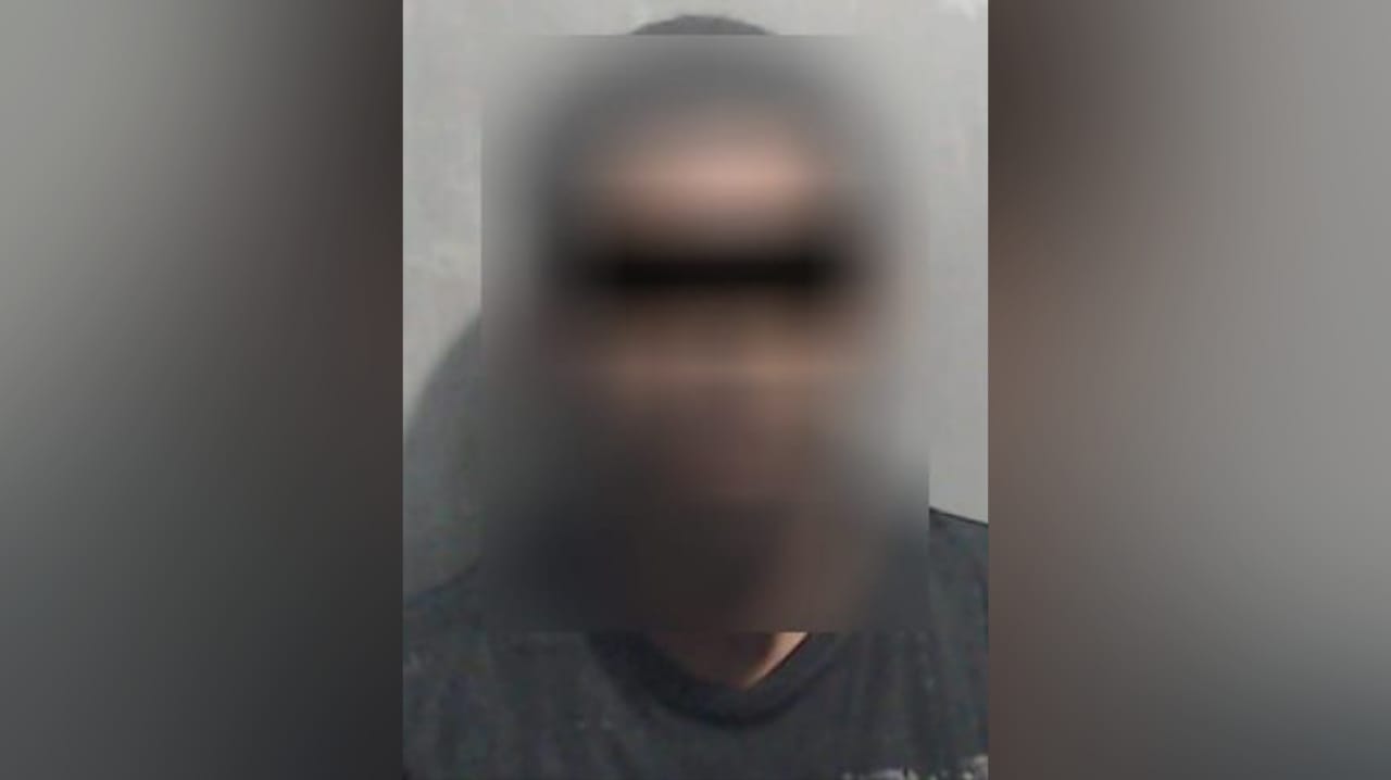 HOMBRE DETENIDO