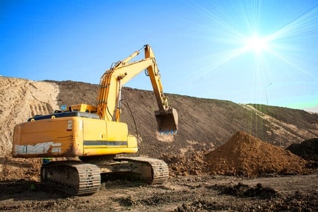 Excavadora en carretera