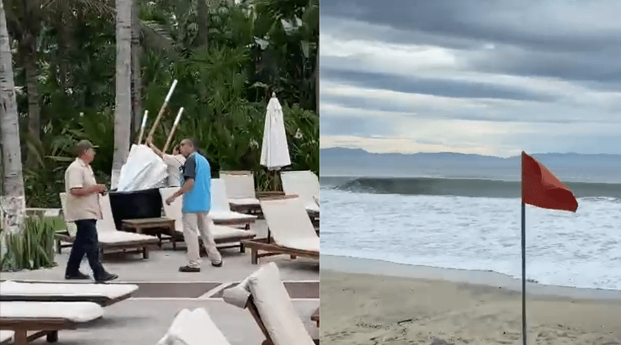 Hotel quita paraguas por impacto de huracán, Mar con bandera roja por nublado