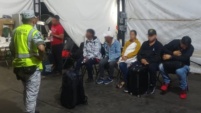 Migrantes rescatados por la Guardia Nacional