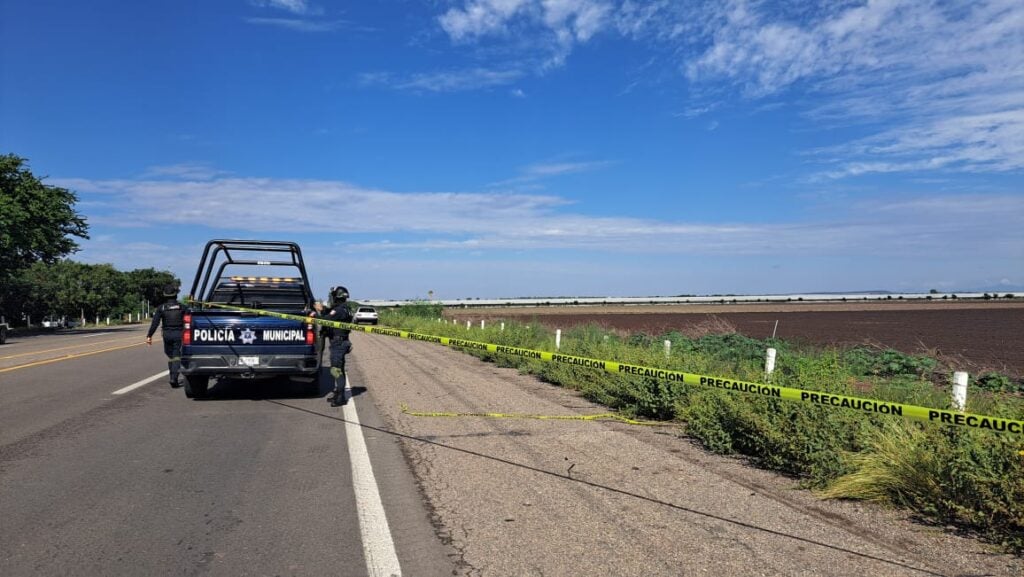 Policía Municipal en zona asegurada con cinta amarilla