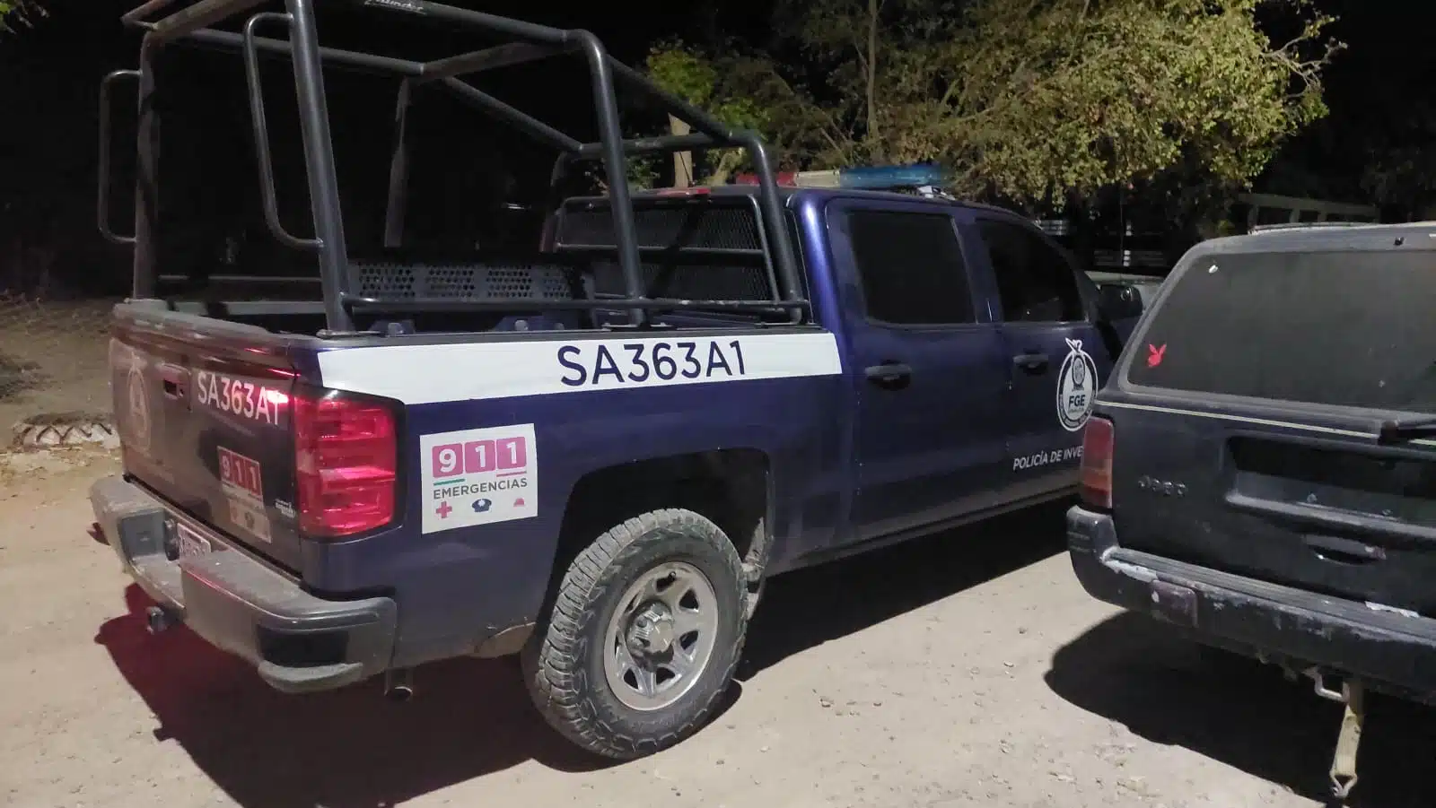 camioneta de la Policía de Investigación