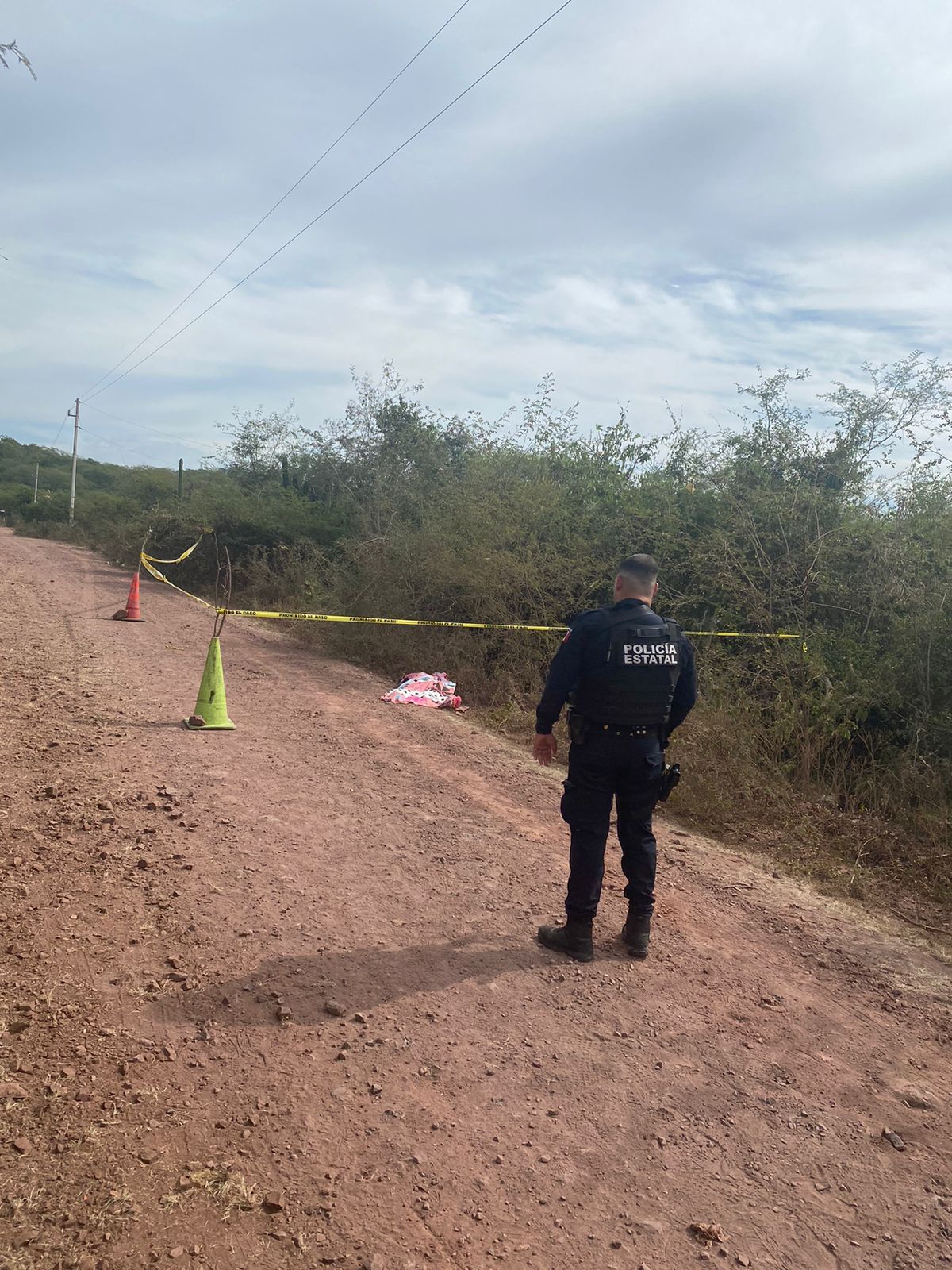 Policía Estatal en la zona acordonada donde ocurrió el deceso