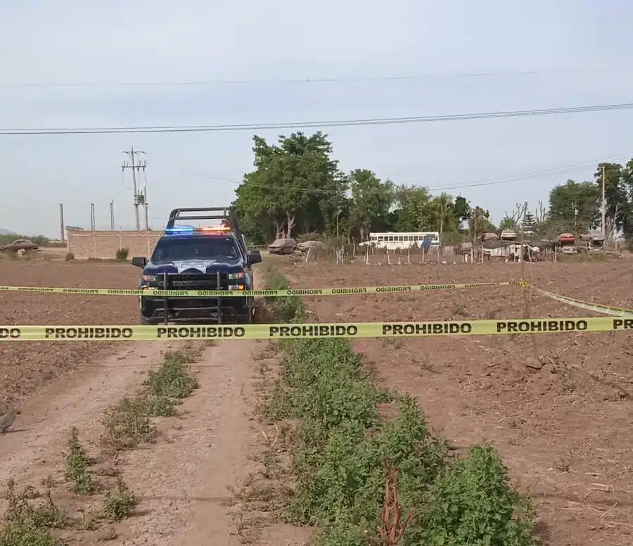 Zona acordonada y una patrulla de la Policía Estatal