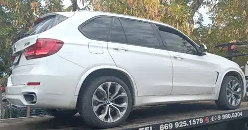 camioneta BMW, línea X5, tipo vagoneta y modelo 2014