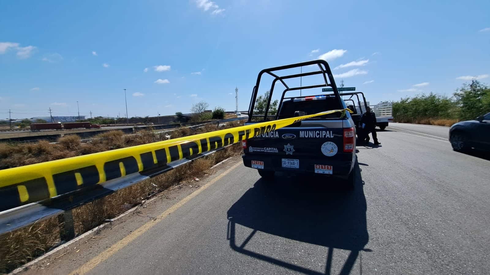 cinta amarilla delimitando la zona