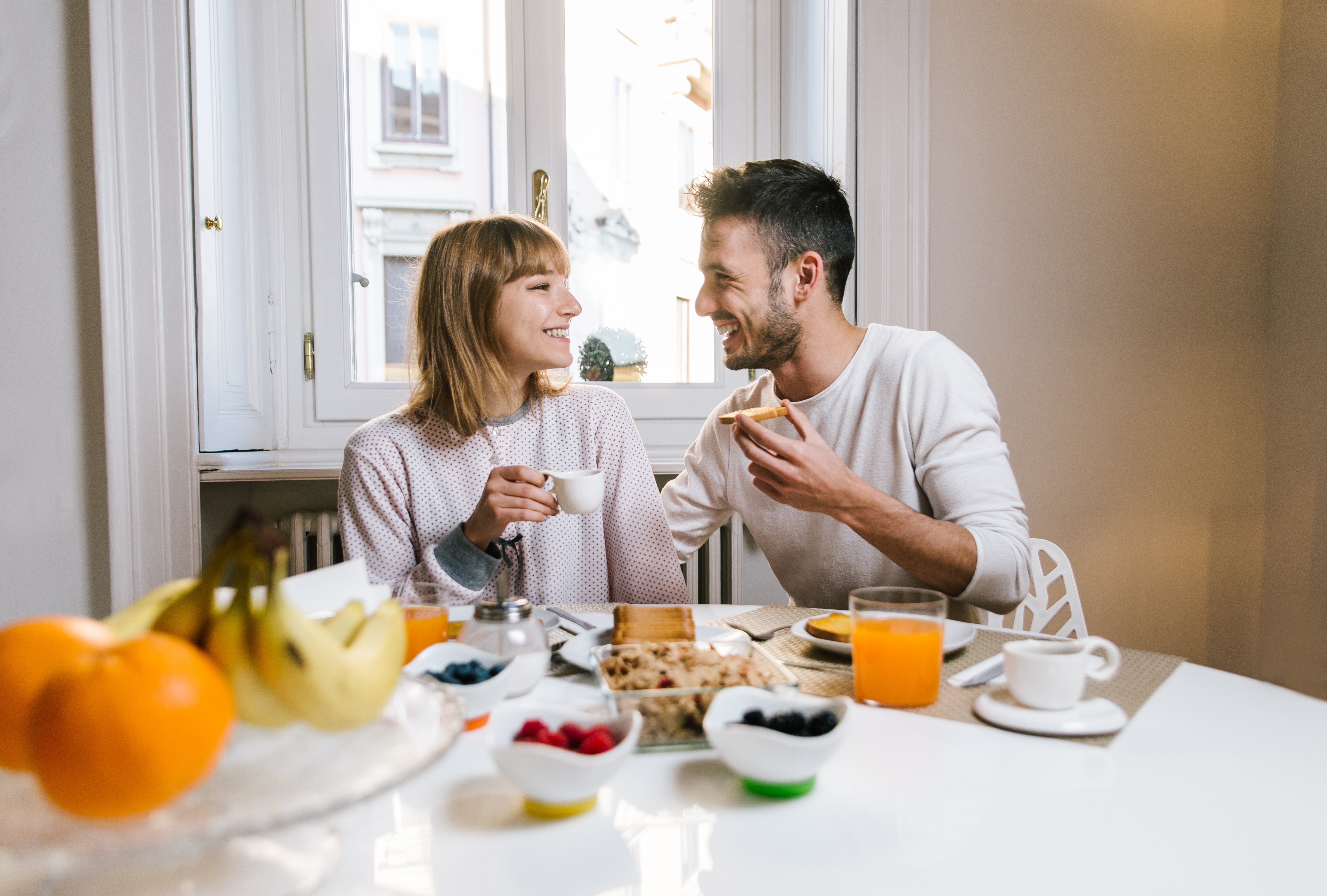 happy-couple-having-healthy-breakfast-together-at-2023-11-27-05-15-46-utc