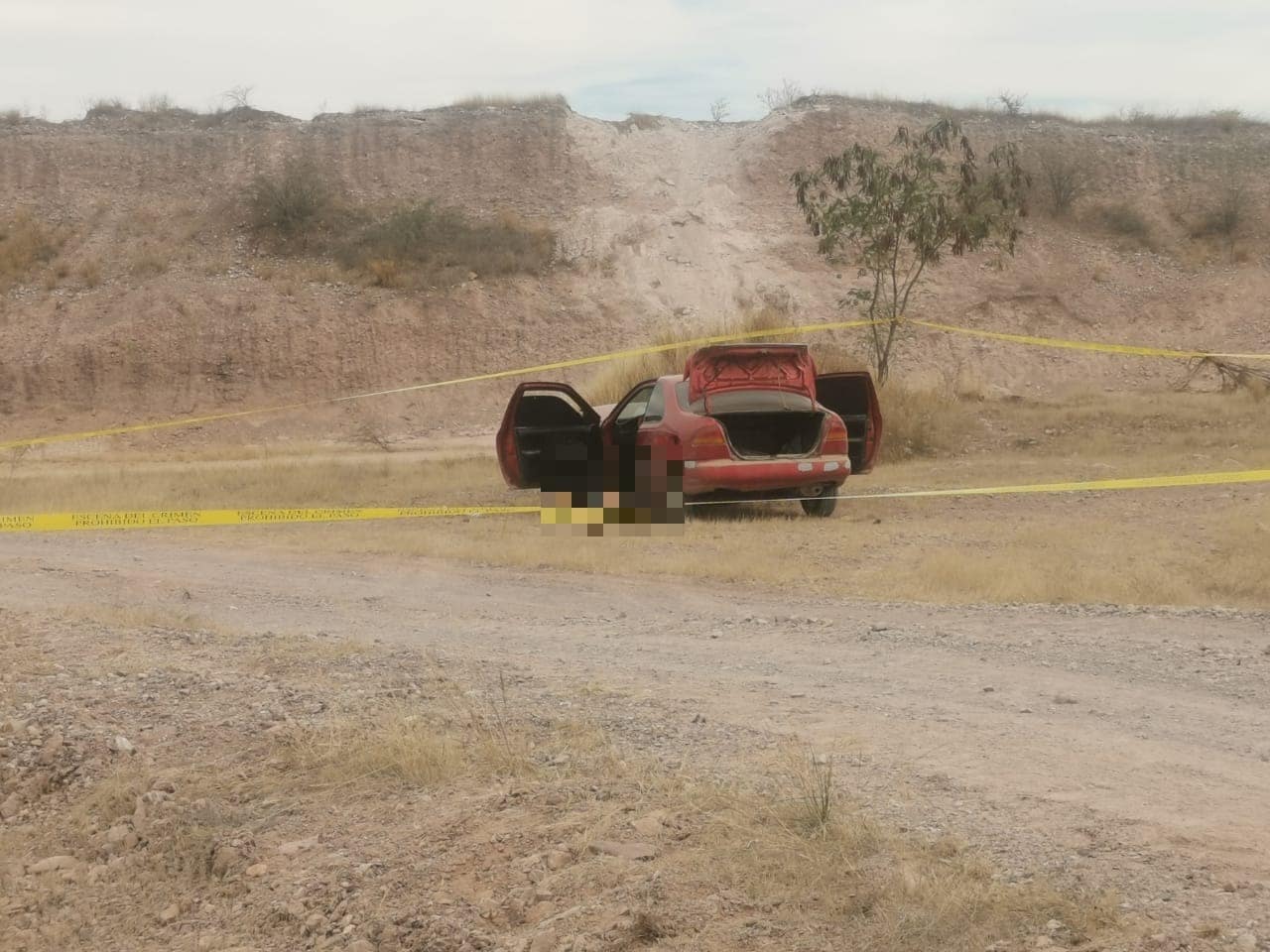 Cinta amarilla delimitando zona