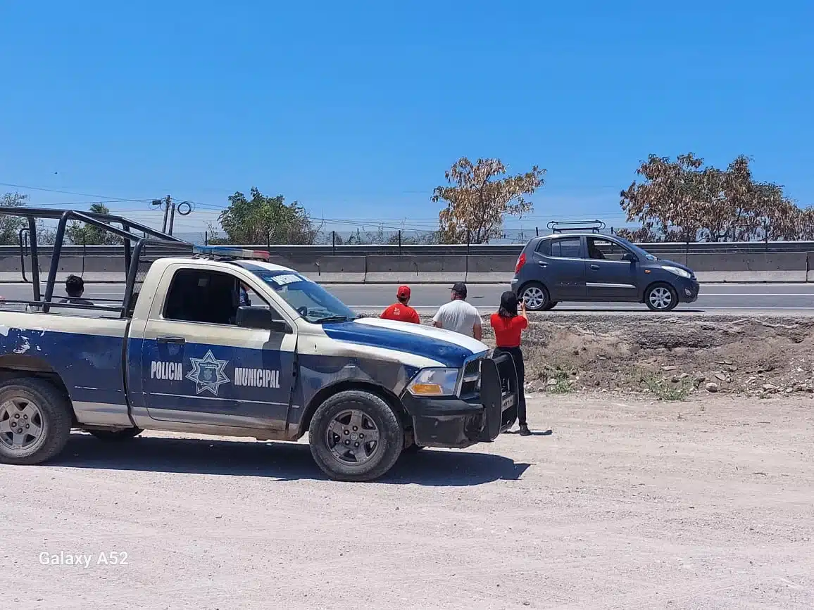 Elementos de la policía municipal en el lugar del homicidio.