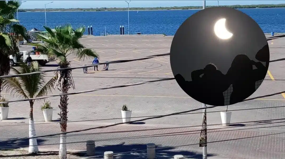 Altata, Navolato (fondo), personas observando eclipse solar (circulo)