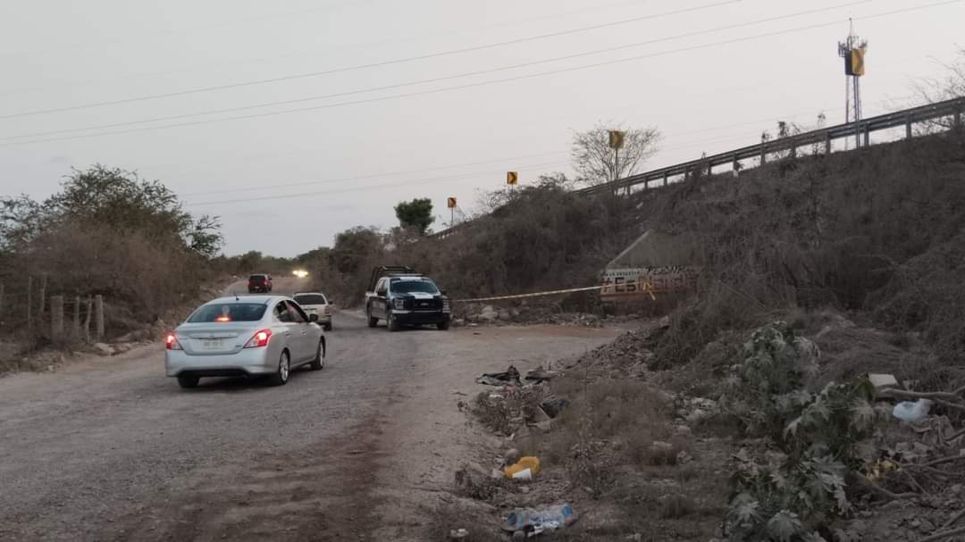 La policía acordona el área donde se encontró el cuerpo embolsado