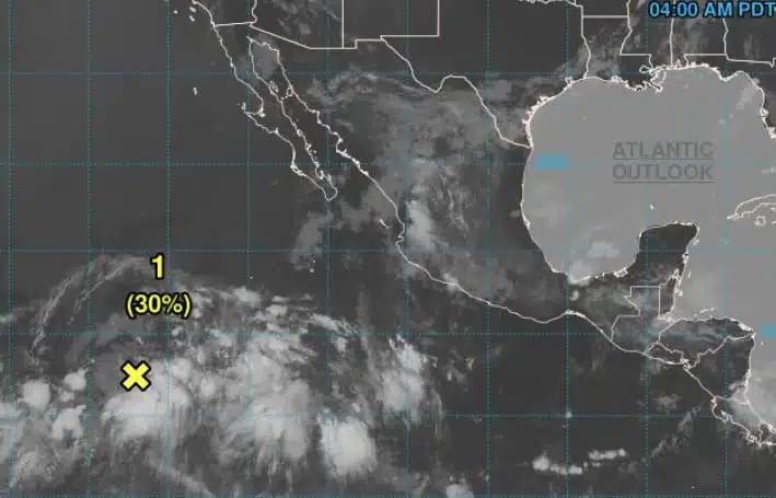 En este punto marca el NHC la zona de baja presión con probabilidad de convertirse en depresión tropical durante esta semana. (1)
