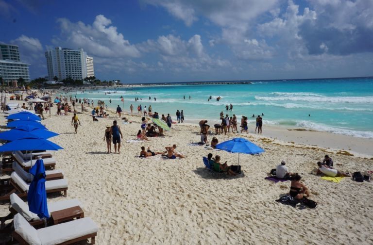 Personas de vacaciones en la Playa