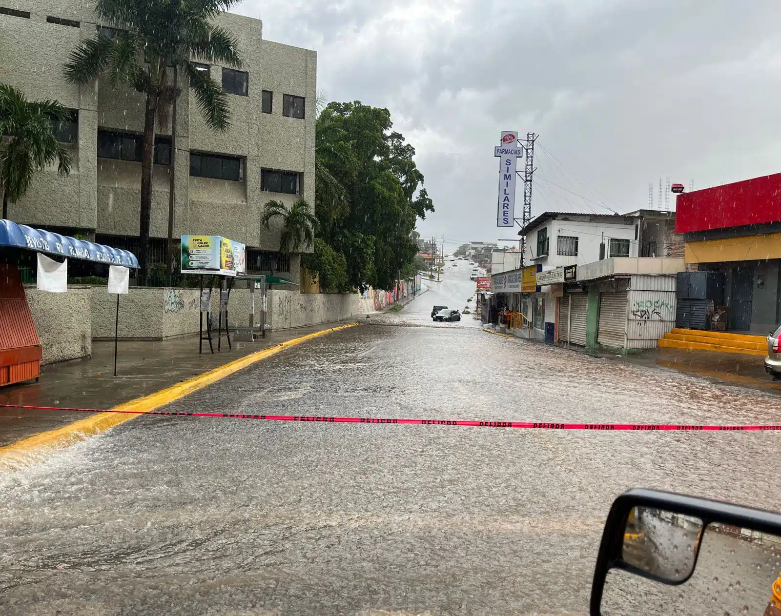 Zona acordonada donde el vehículo fue arrastrado tras la intensa lluvia