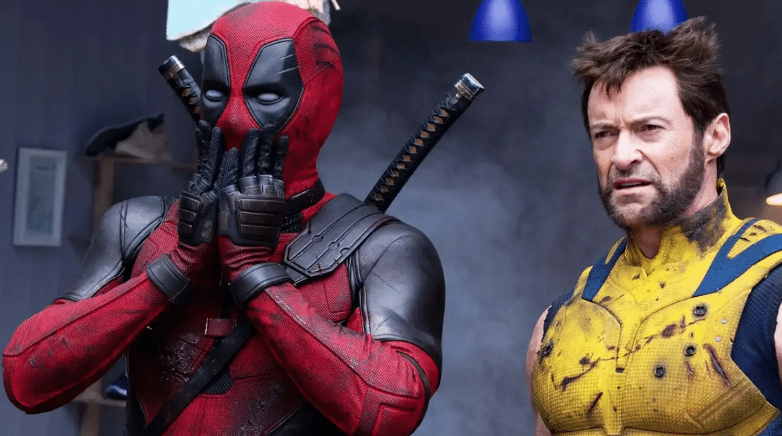 Reynols y Jackman en sus personajes en 