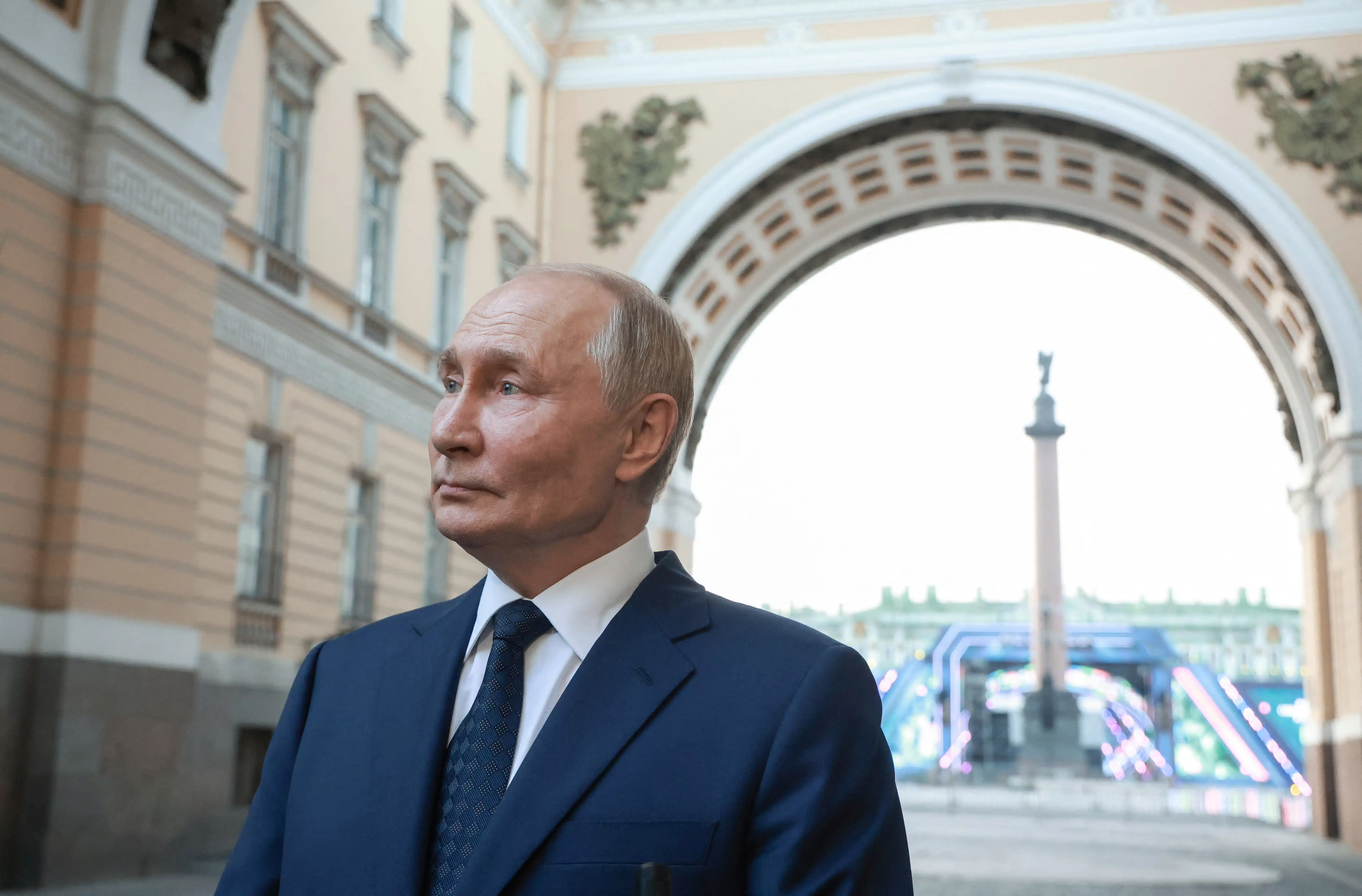 Russian President Vladimir Putin talks to journalists in Saint Petersburg