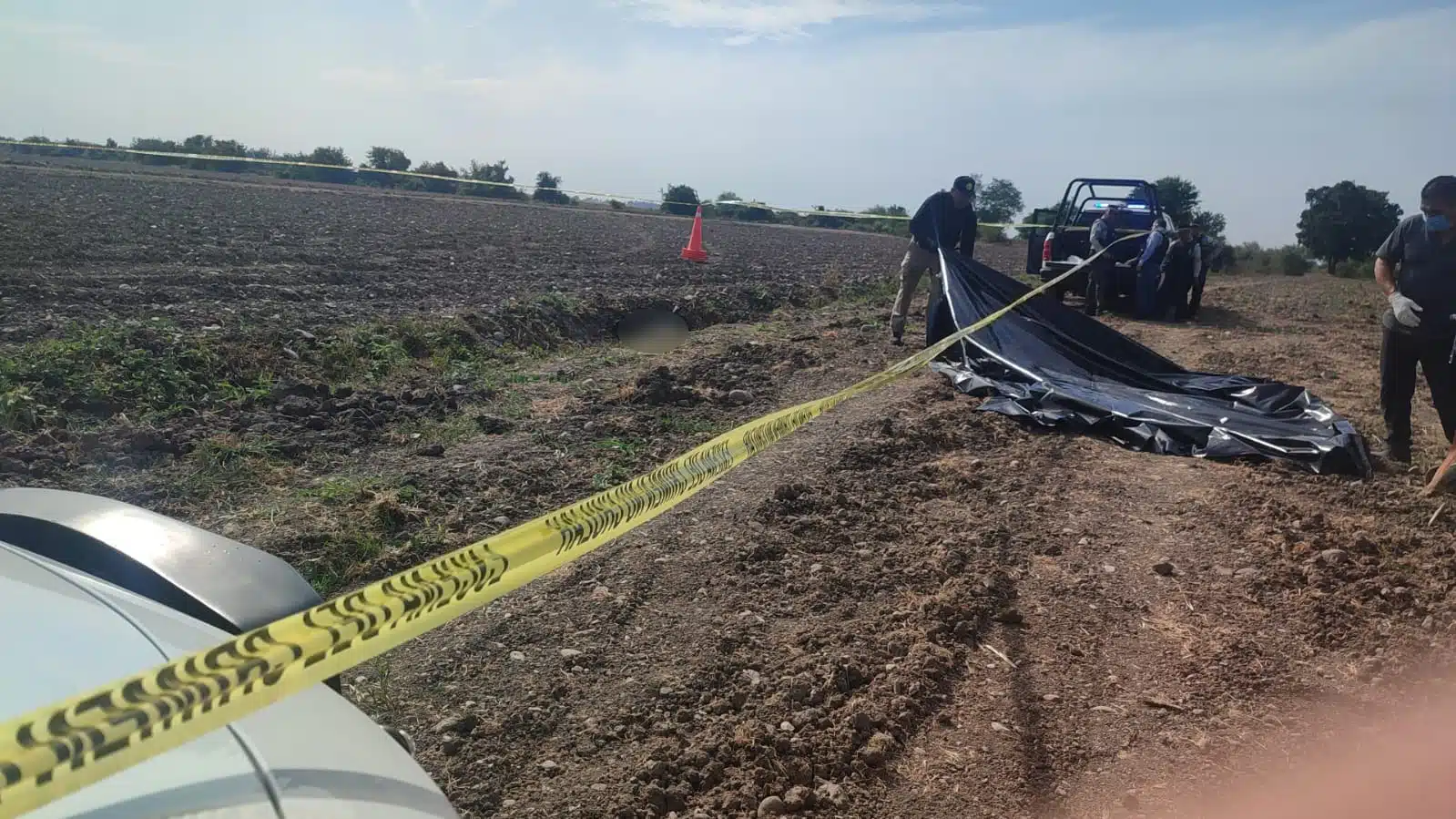 Zona acordonada donde fue encontrado el cuerpo carbonizado.