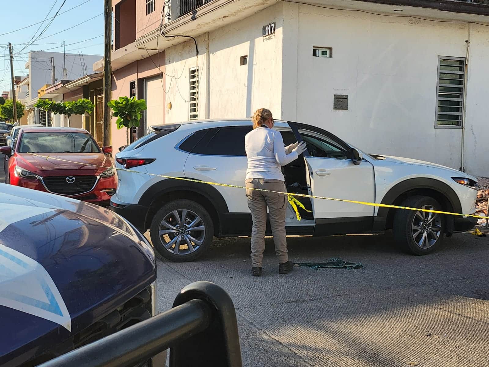 Personal de Dirección General de Investigación Pericial en el lugar de los hechos.