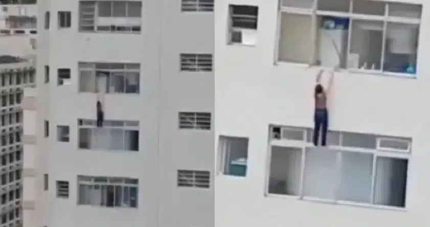 VIDEO: Mujer queda colgando de un edificio de 10 pisos mientras limpiaba una ventana en Brasil