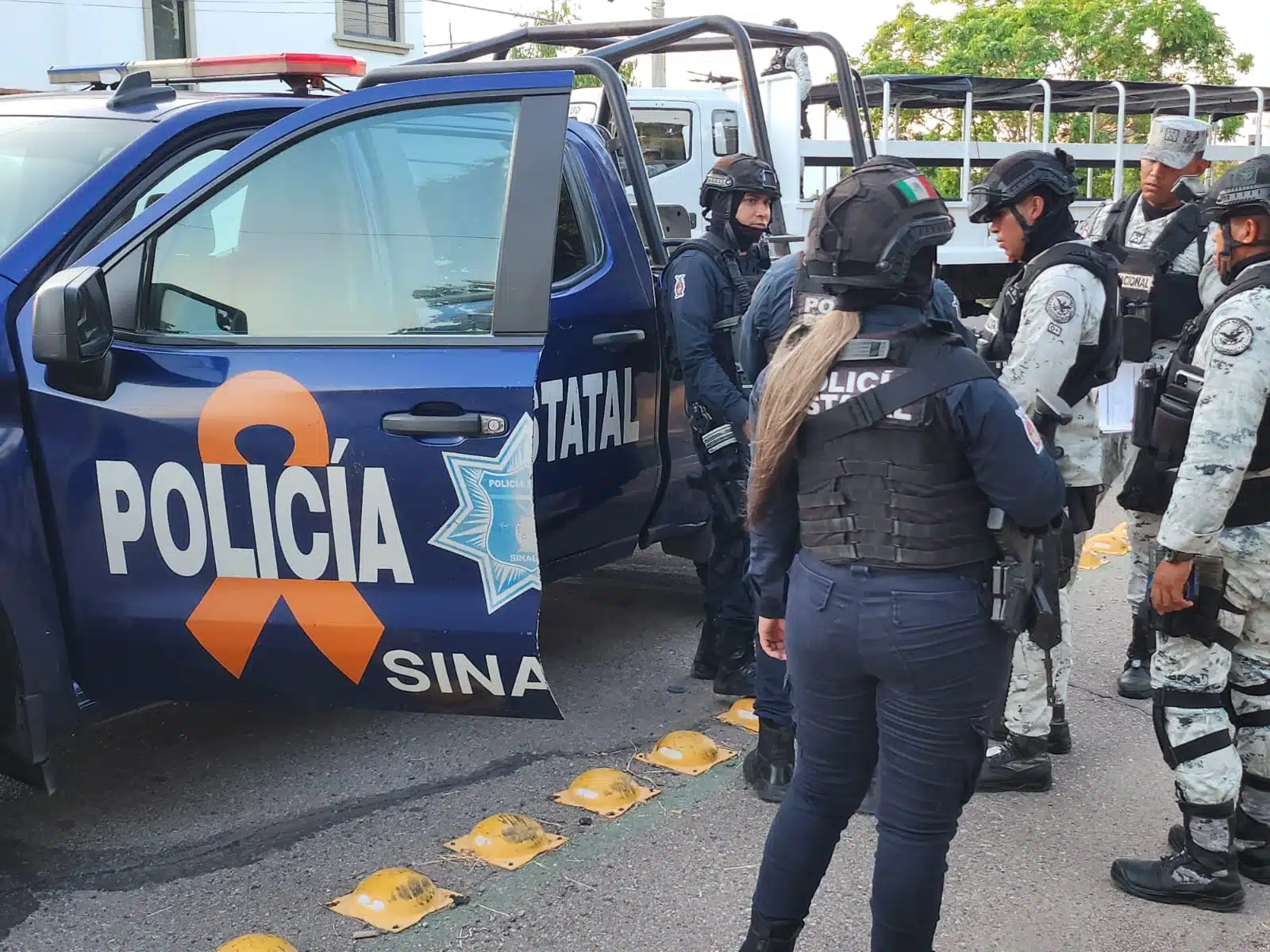 Elementos de la Policía Estatal y Guardia Nacional.