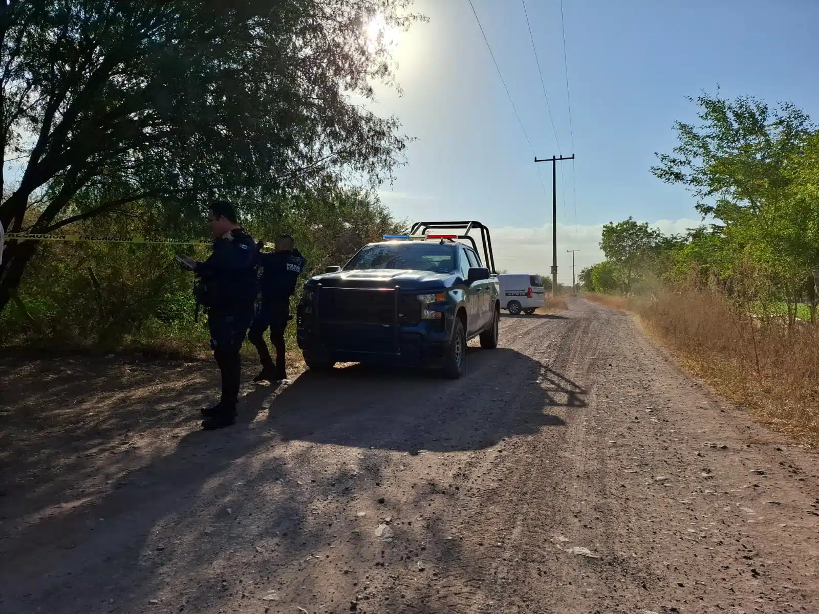 Elementos de la Policía Estatal resguardando el área.