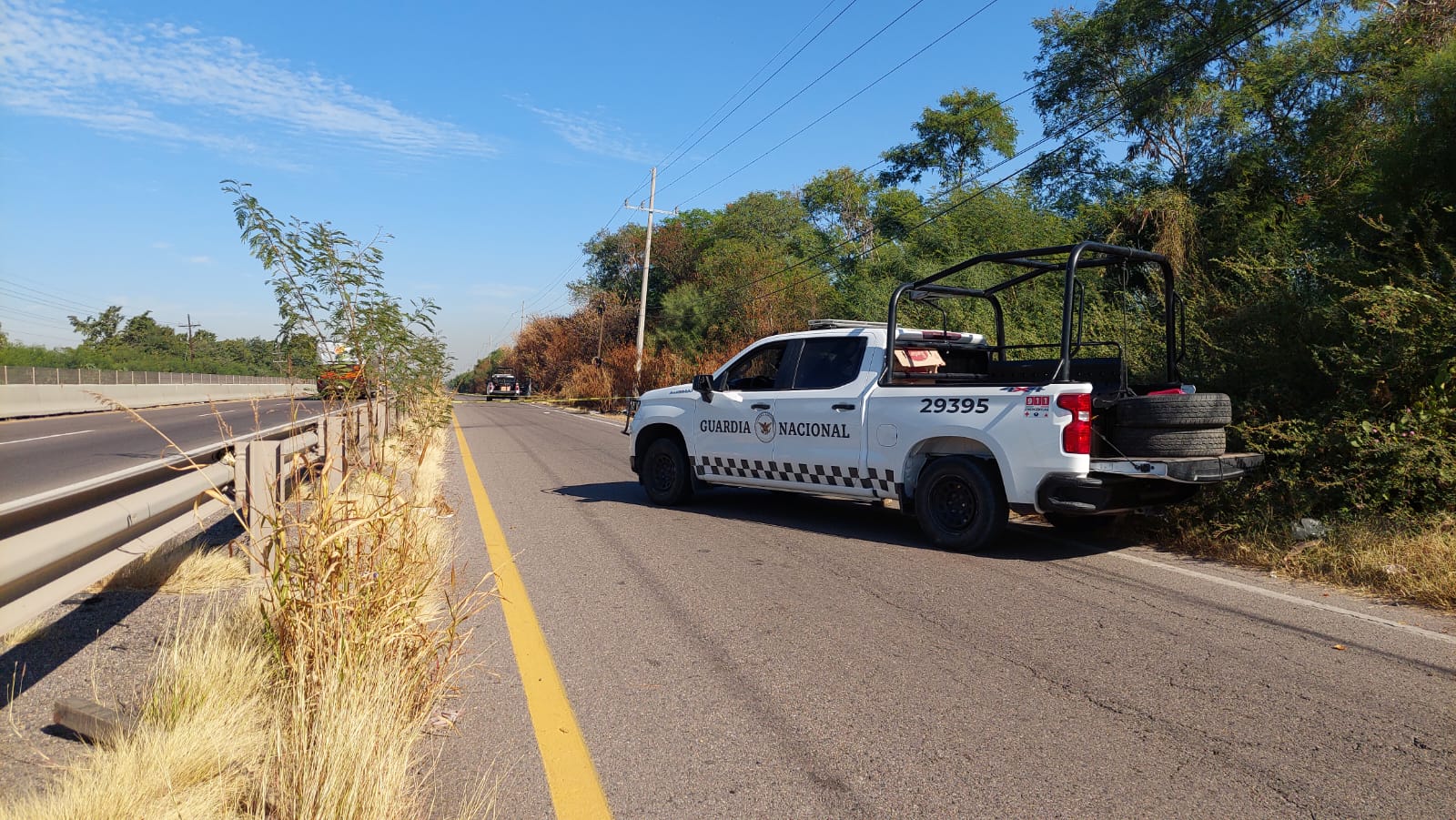 Guardia Nacional donde se localizaron tres cuerpos sin vida