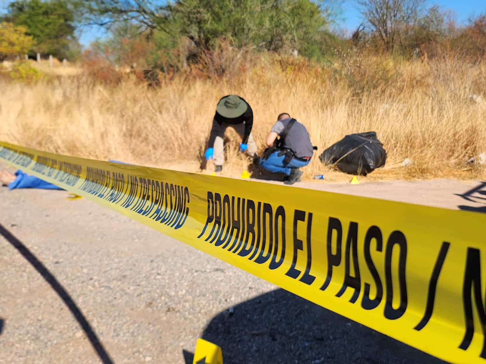Cinta amarilla delimitando zona