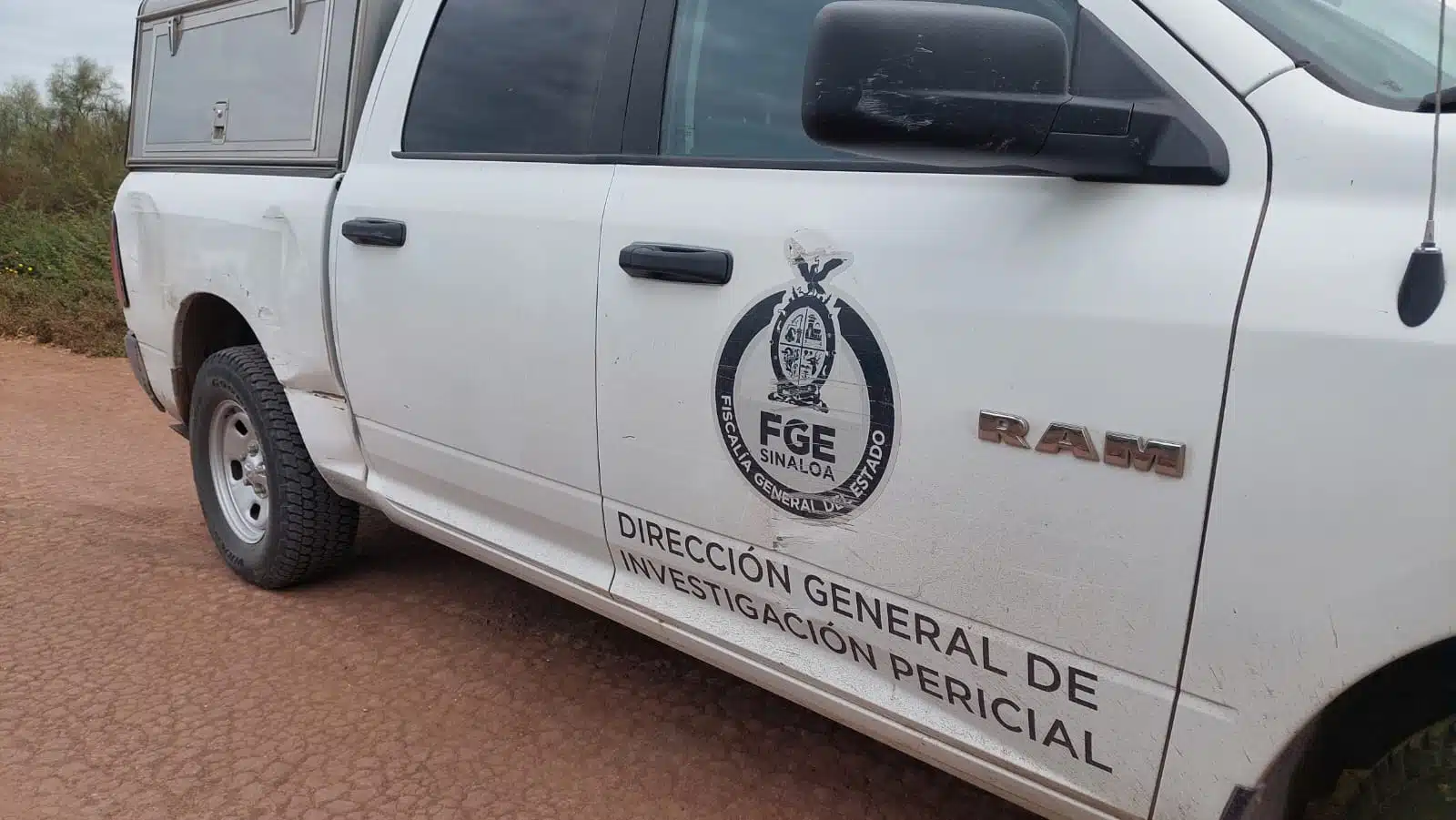 Camioneta de la Policía de Investigación de la FGE