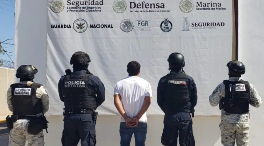 Detención de una persona al portal un arma de fuego