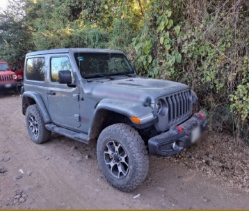 Camioneta Jeep asegurada.