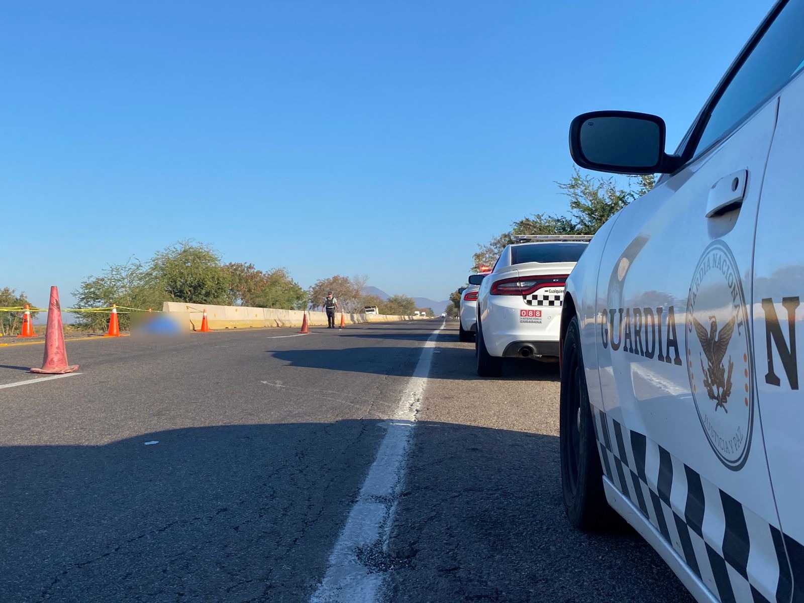 Guardia Nacional resguardando en lugar en donde fue encontrado el hombre asesinado.