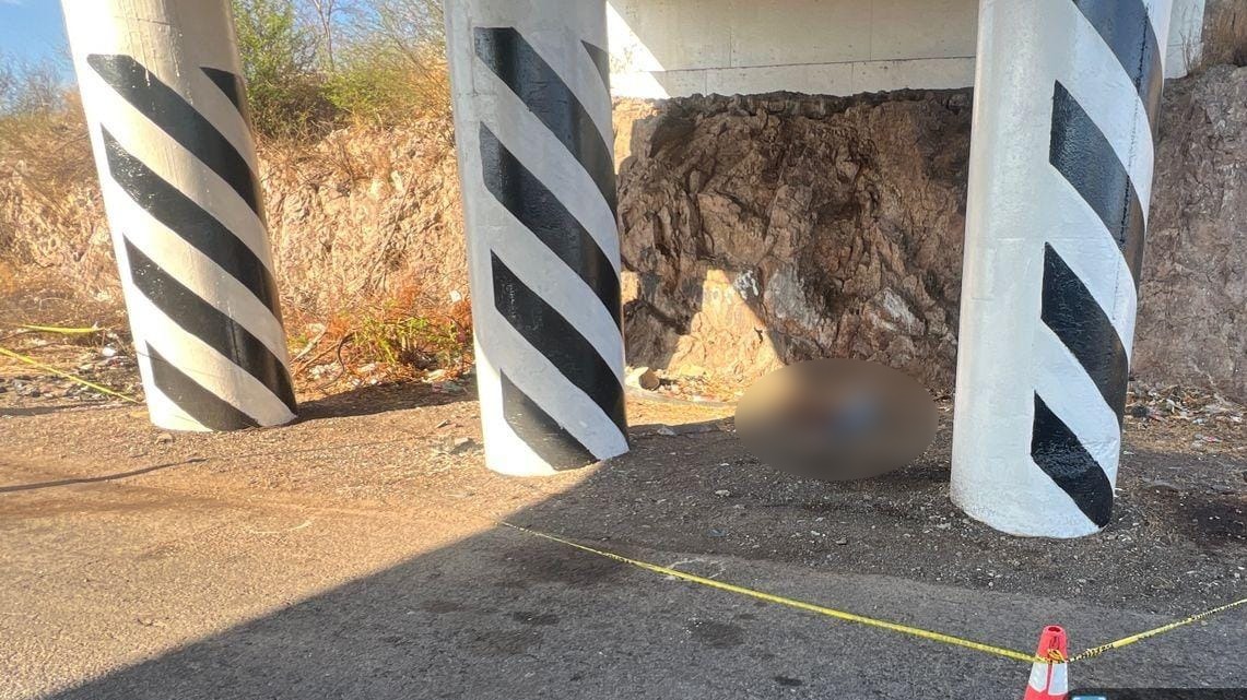 Zona acordonada en donde fue localizado el hombre asesinado.