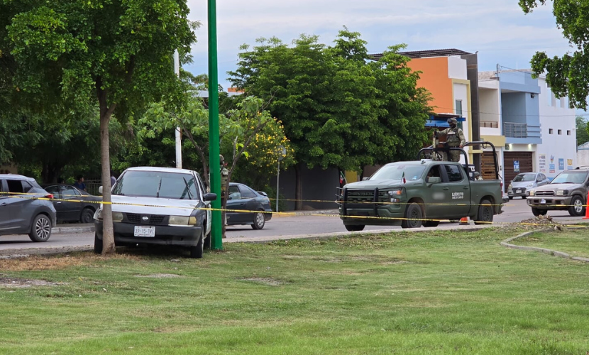 Elementos del Ejército Mexicano resguardan el lugar donde se cometió el homicidio