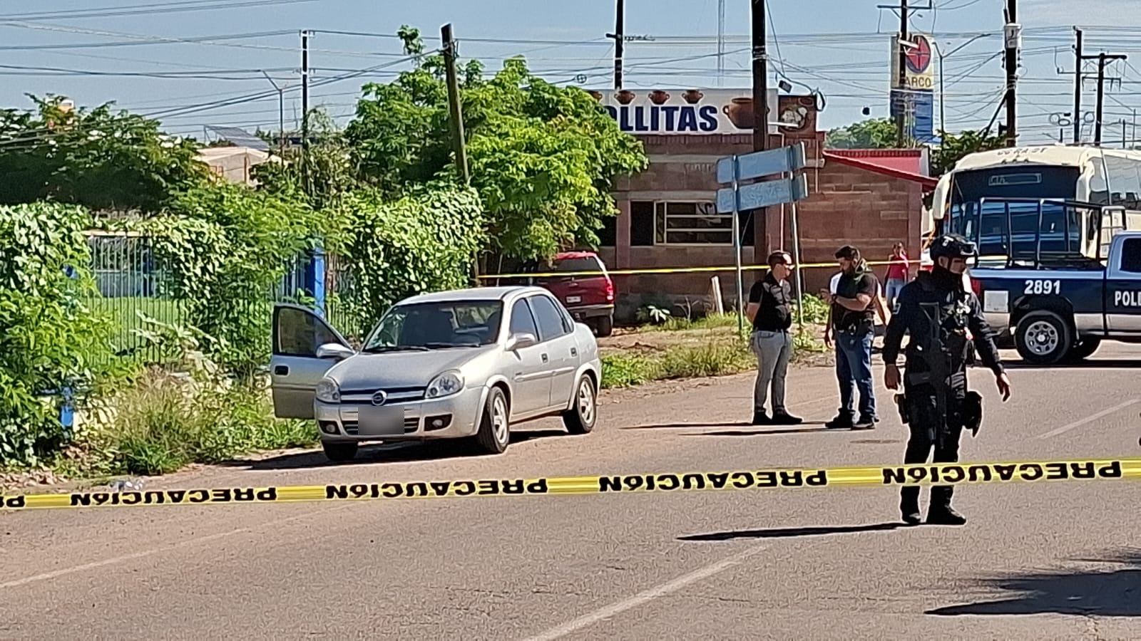 Zona acordonada y resguardada por los elementos de seguridad.