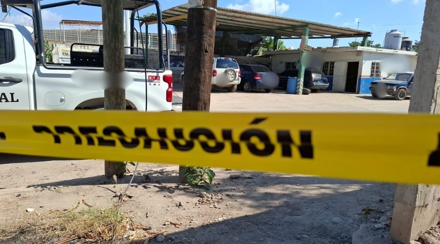 Cinta amarilla y detrás una unidad de Guardia Naciona en Villa Juárez Navolato
