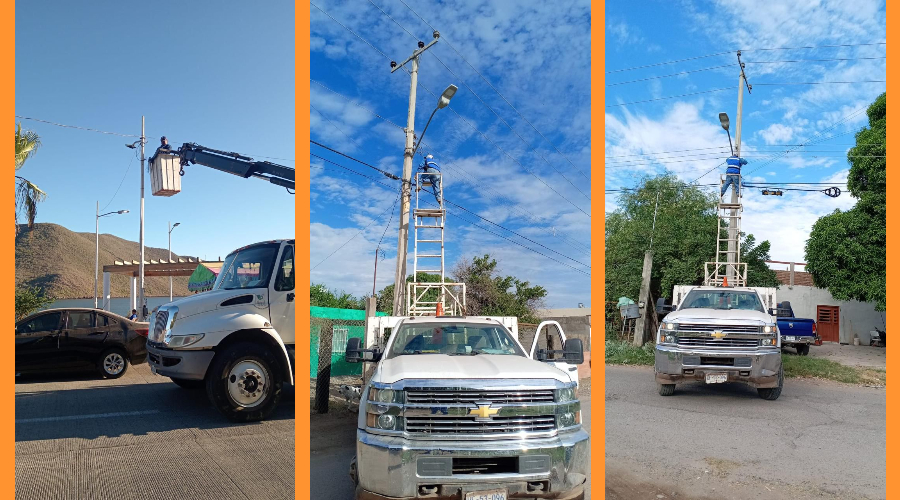 Personal de obras publicas colocando nuevas luminarias