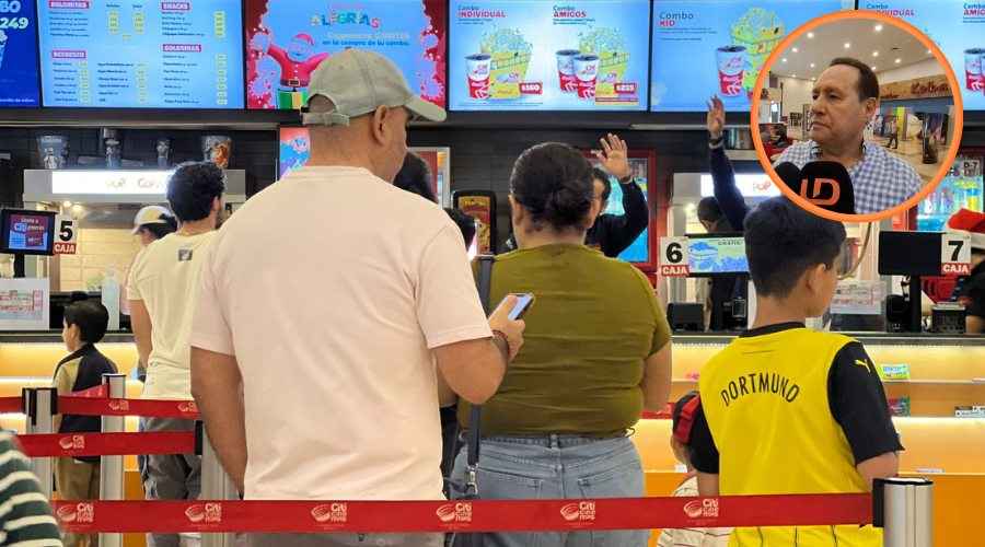 tres personas haciendo fila en el citicinemas para comprar palomitas