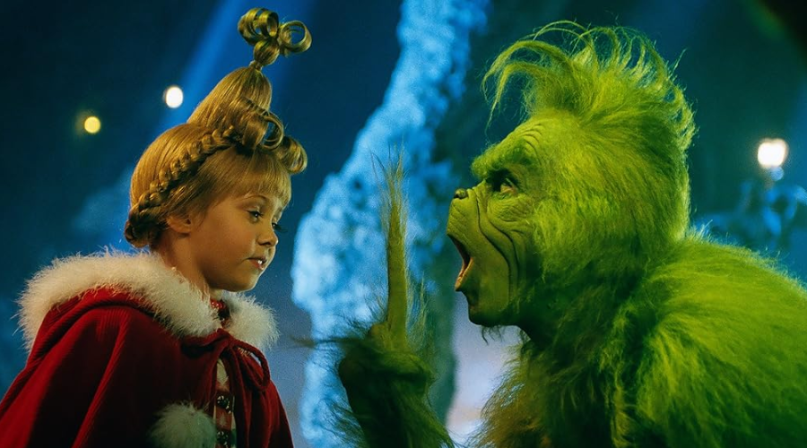 el actor Jim Carrey y la cantante Taylor Momsen protagonistas de El Grinch
