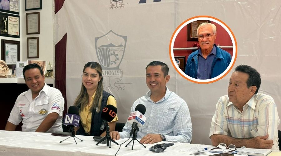Personas en una rueda de prensa sentadas y en un círculo una persona