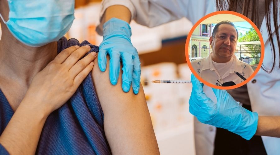 Persona del sector salud aplicando vacuna a una persona