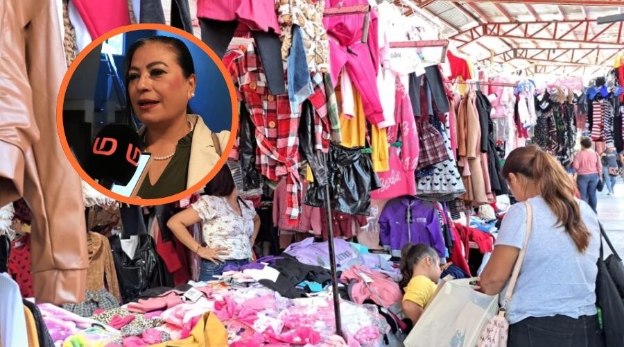 Ropa colgada en un puesto junto a la presidenta de la Cámara Nacional del Comercio en Mazatlán, Francis Cázares Oliveros