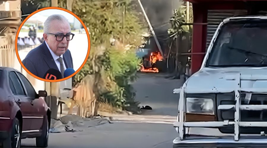 Calle bloqueada con vehículo incendiado (fondo), Rubén Rocha Moya (circulo)