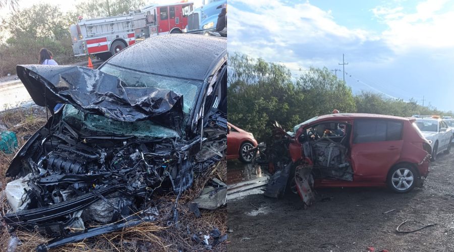 Carros destrozados luego de un accidente sobre la carretera