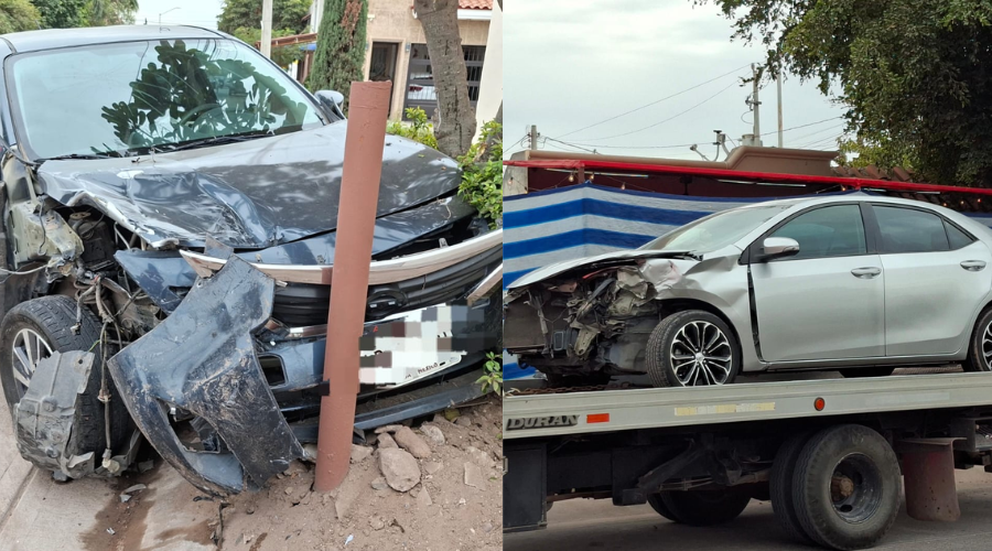Dos autos con daños en la parte delantera, uno estrellado en un poste y otro siendo llevado por una grúa