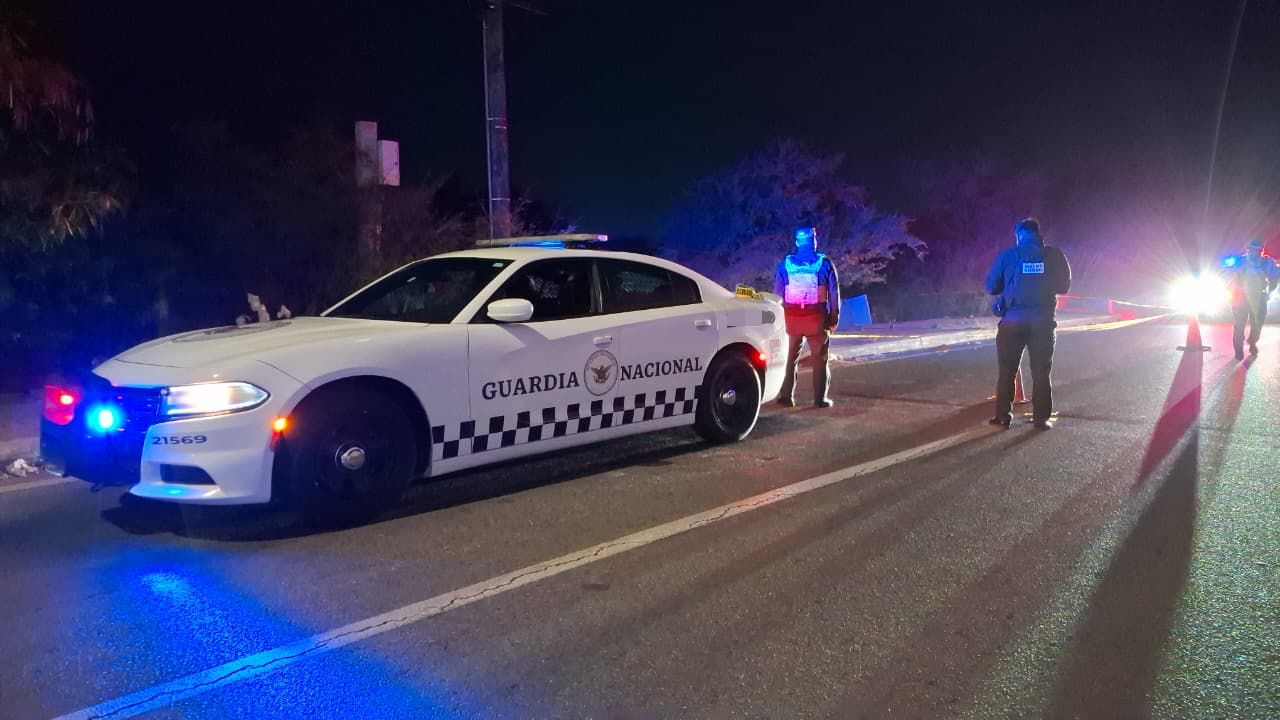Guardia Nacional resguardando la escena del crimen.