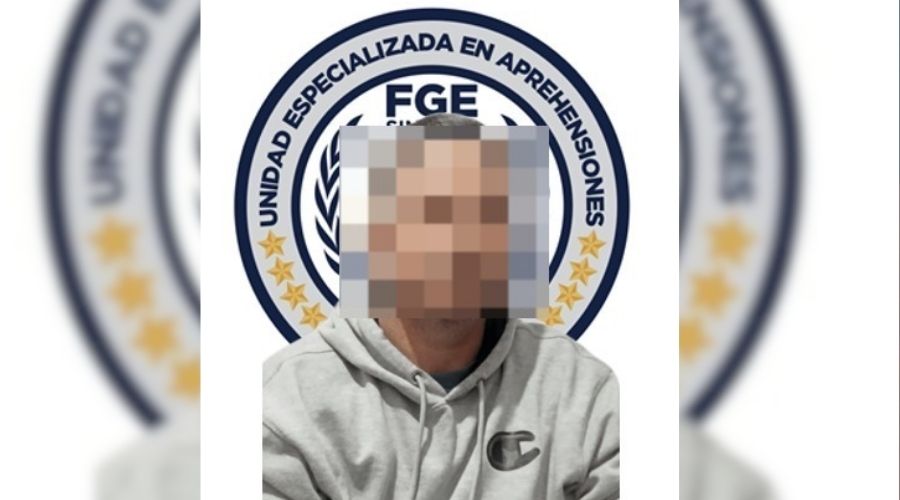 Persona con sueter gris y difuminado en la cara